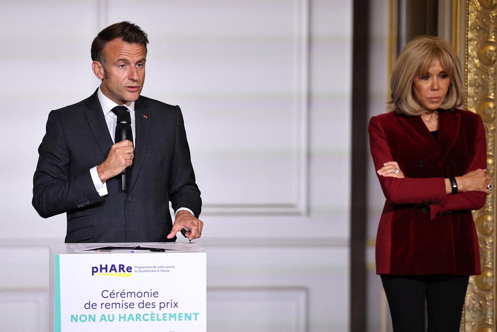 French President Emmanuel Macron speaks next to his wife Brigitte Macron at the 'No to Bullying' award ceremony at Elysee Palace in Paris, France, May 21, 2025. France's Ministry of National Education organizes each year the Non au harcelement (No to Bullying) contest in schools to raise awareness and promote values such as kindness and inclusion.  Christophe Petit Tesson/Pool via REUTERS Photo: CHRISTOPHE PETIT TESSON/REUTERS