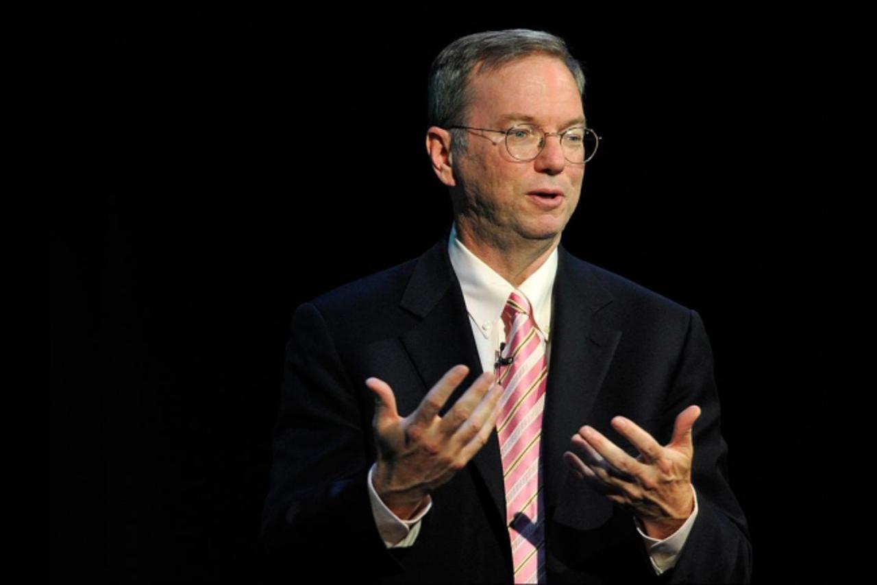 'Google CEO Eric Schmidt gestures as he speaks at the Guardian Activate conference discussing technology, society and the future by \'changing the world through the internet\' on July 01, 2010 in cent