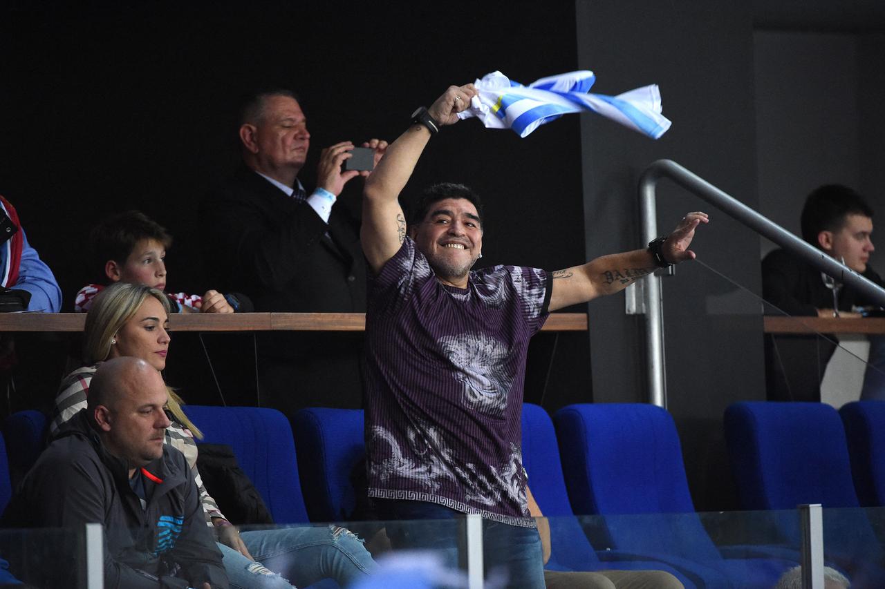 FILE PHOTO: Argentinian soccer legend Diego Armando Maradona reacts to fans during his first training session as coach of Dorados at the Banorte stadium in Culiacan, in the Mexican state of Sinaloa