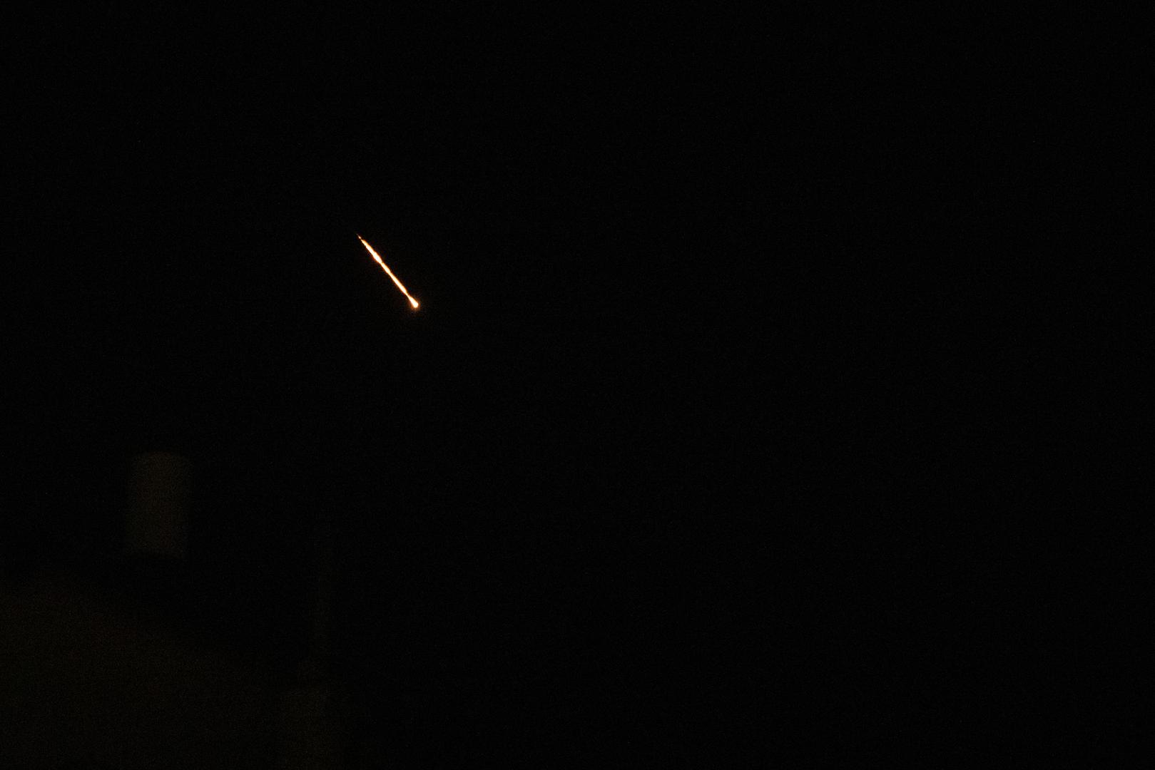 (240414) -- JERUSALEM, April 14, 2024 (Xinhua) -- This photo taken on April 14, 2024 shows flares from explosions in the sky over Jerusalem as Israel's Iron Dome anti-missile system intercepts missiles and drones from Iran. A combined attack of dozens of ballistic missiles and hundreds of drones from Iran triggered air raid alerts across Israel early on Sunday, the Israeli army said, as residents reported multiple bombings were heard. (Xinhua/Chen Junqing) Photo: Chen Junqing/XINHUA