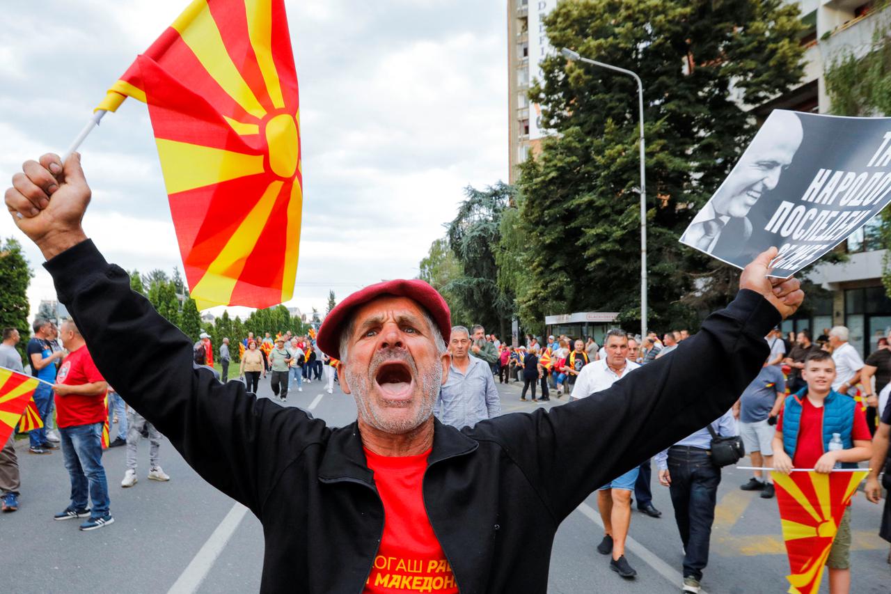 Supporters of North Macedonia's biggest opposition party VMRO-DPMNE attend a protest demanding early elections, in Skopje