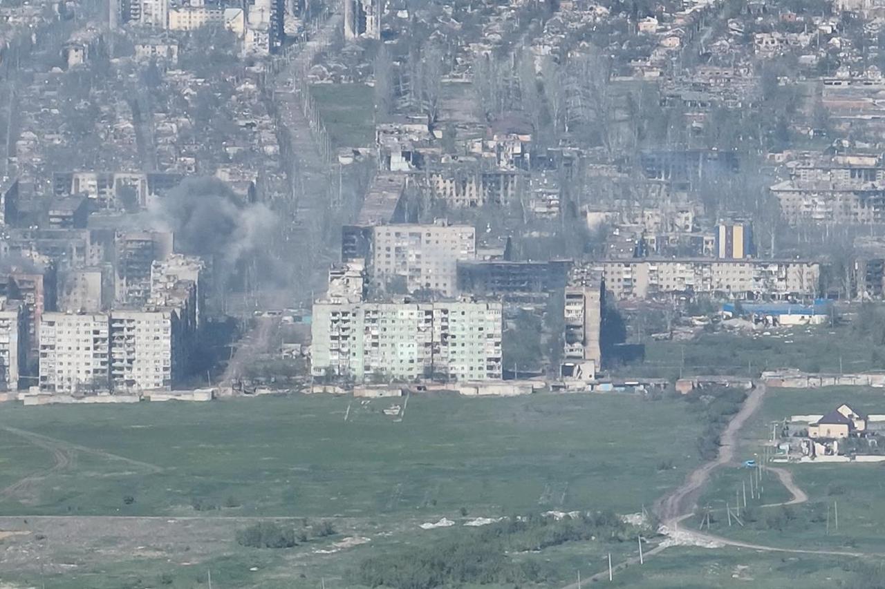 FILE PHOTO: Smoke erupts following a shell explosion in Bakhmut