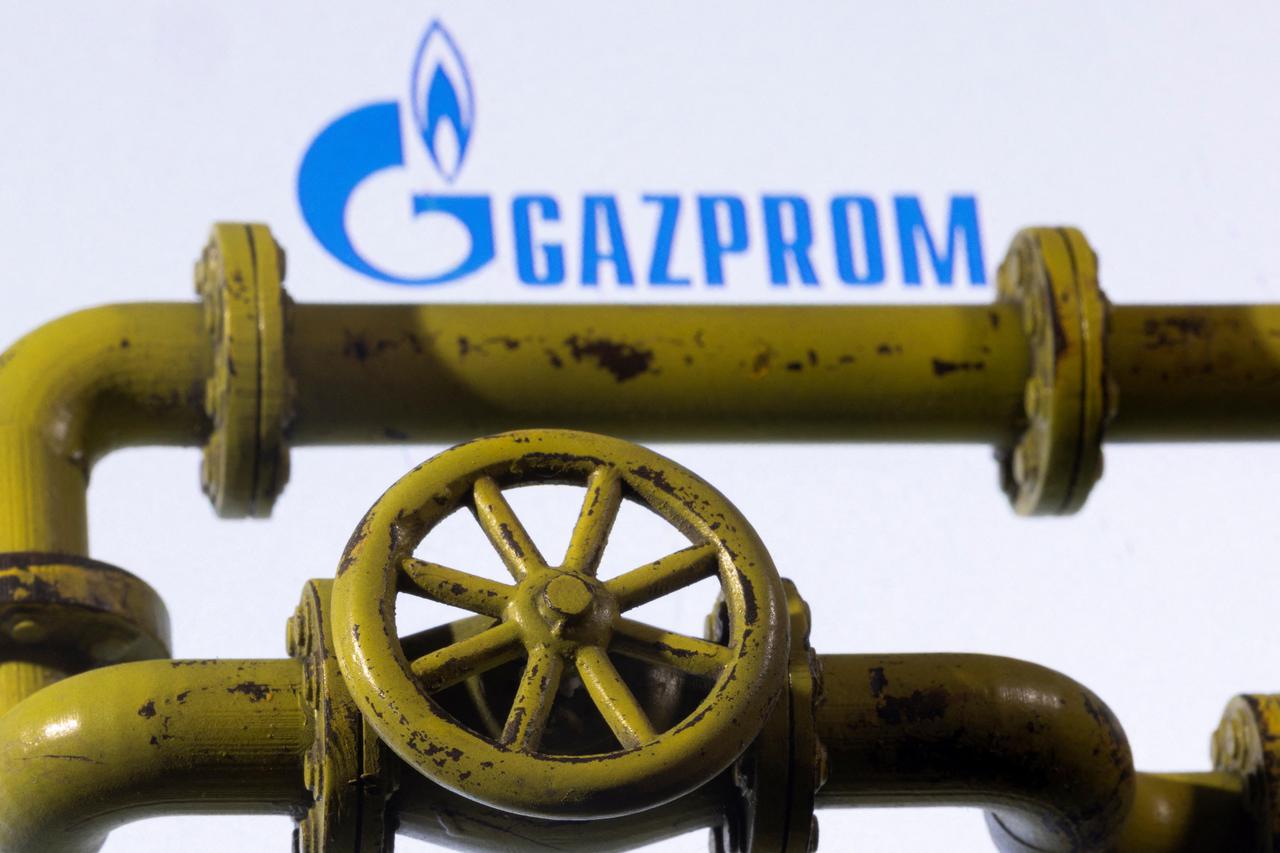 Illustration shows Natural Gas Pipes and Gazprom logo