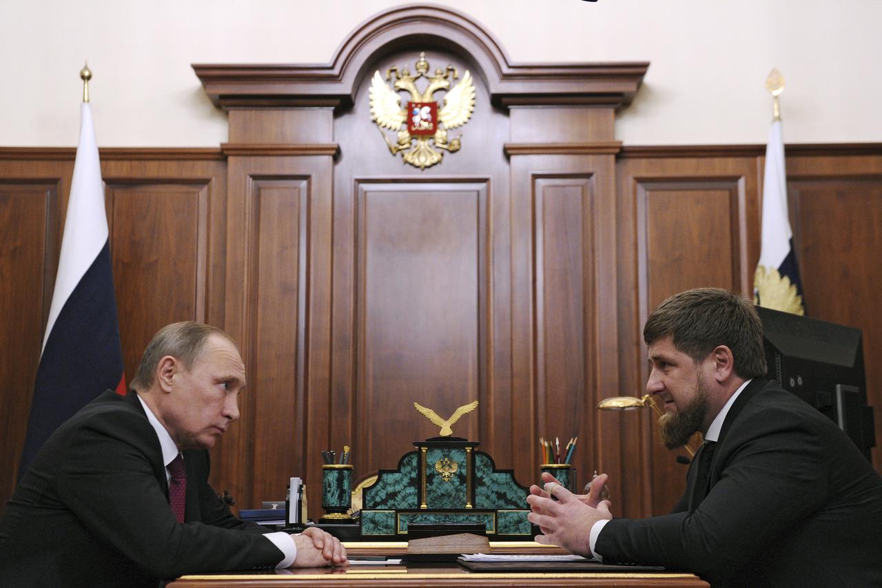 Russian President Vladimir Putin (L) meets with Chechnya's leader Ramzan Kadyrov at the Kremlin in Moscow, Russia, December 10, 2015. REUTERS/Mikhail Klimentyev/Sputnik/Kremlin ATTENTION EDITORS - THIS IMAGE HAS BEEN SUPPLIED BY A THIRD PARTY. IT IS DISTR