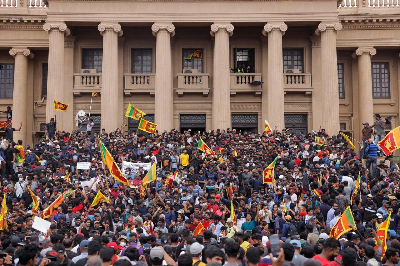 Demonstrators protest at the Presidential Secretariat, after President Gotabaya Rajapaksa fled, in Colombo