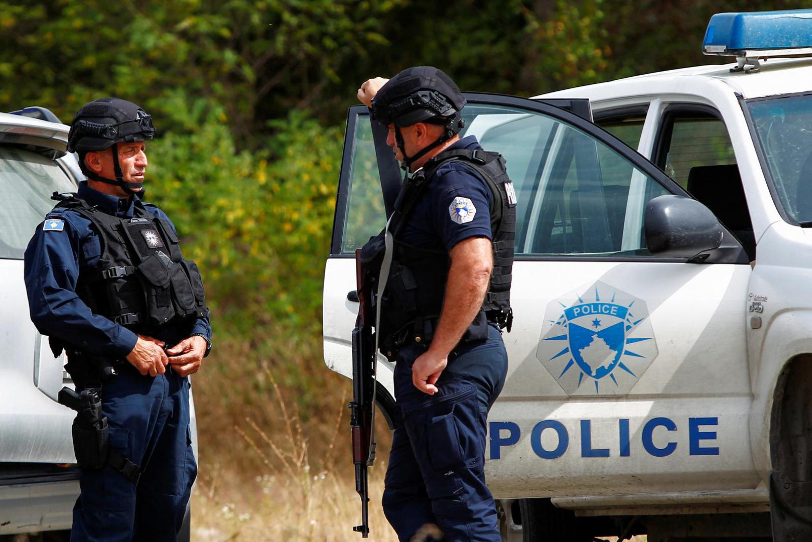 Police officers stand guard in the aftermath of a shooting, near the village of Zvecane, Kosovo September 24, 2023. REUTERS/Ognen Teofilovski Photo: OGNEN TEOFILOVSKI/REUTERS