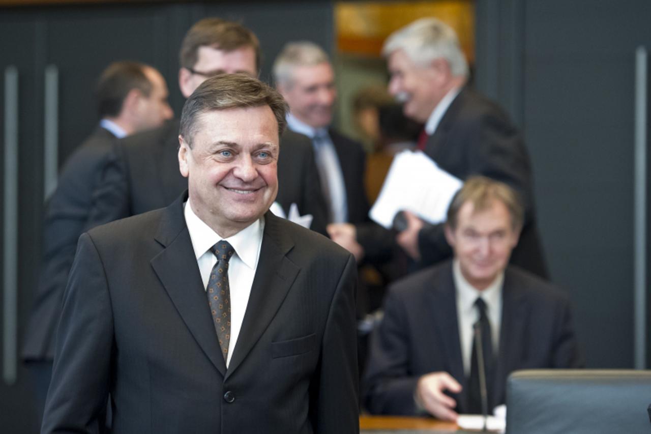 'Slovenian millionaire and former supermarket chief Zoran Jankovic arrives on January 11, 2012 at the parliament in Ljubljana.  The parliament is convening to debate the investiture of Jankovic as pri