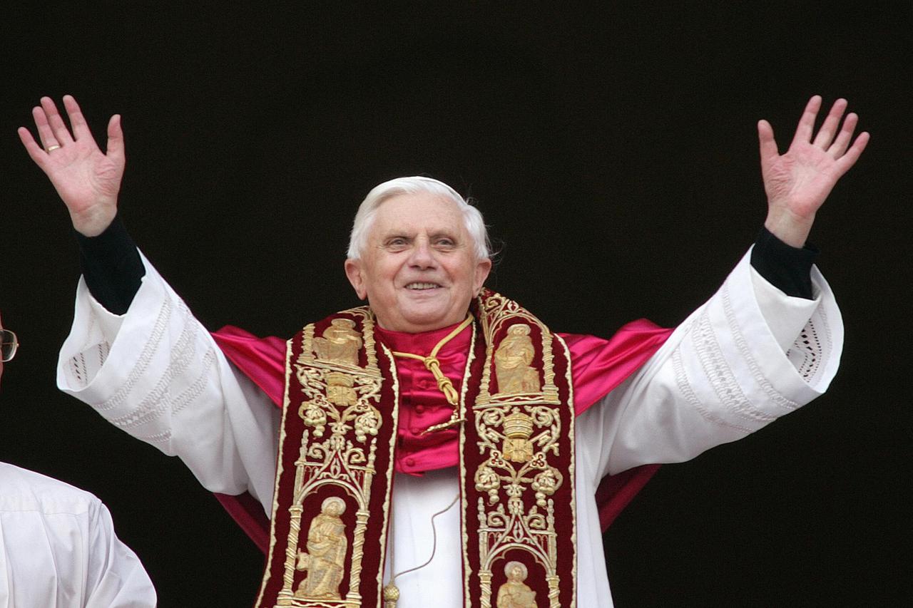 FILE PHOTO: Pope Benedict XVI, Cardinal Joseph Ratzinger of Germany, waves from a balcony of St. Peter's ...