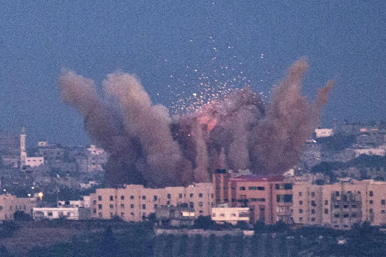 'TOPSHOTS  A picture taken from the southern Israeli town of Sderot shows smoke billowing from a spot targeted by an Israeli air strike inside the Gaza strip on November 15, 2012. The UN Security Coun