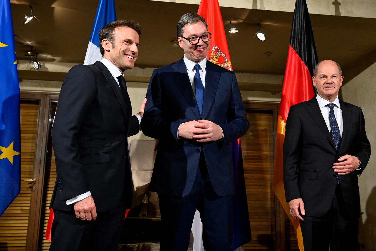 German Chancellor Olaf Scholz, French President Emmanuel Macron and Serbia's President Aleksandar Vucic attend their bilateral meeting at the Munich Security Conference (MSC) in Munich, Germany