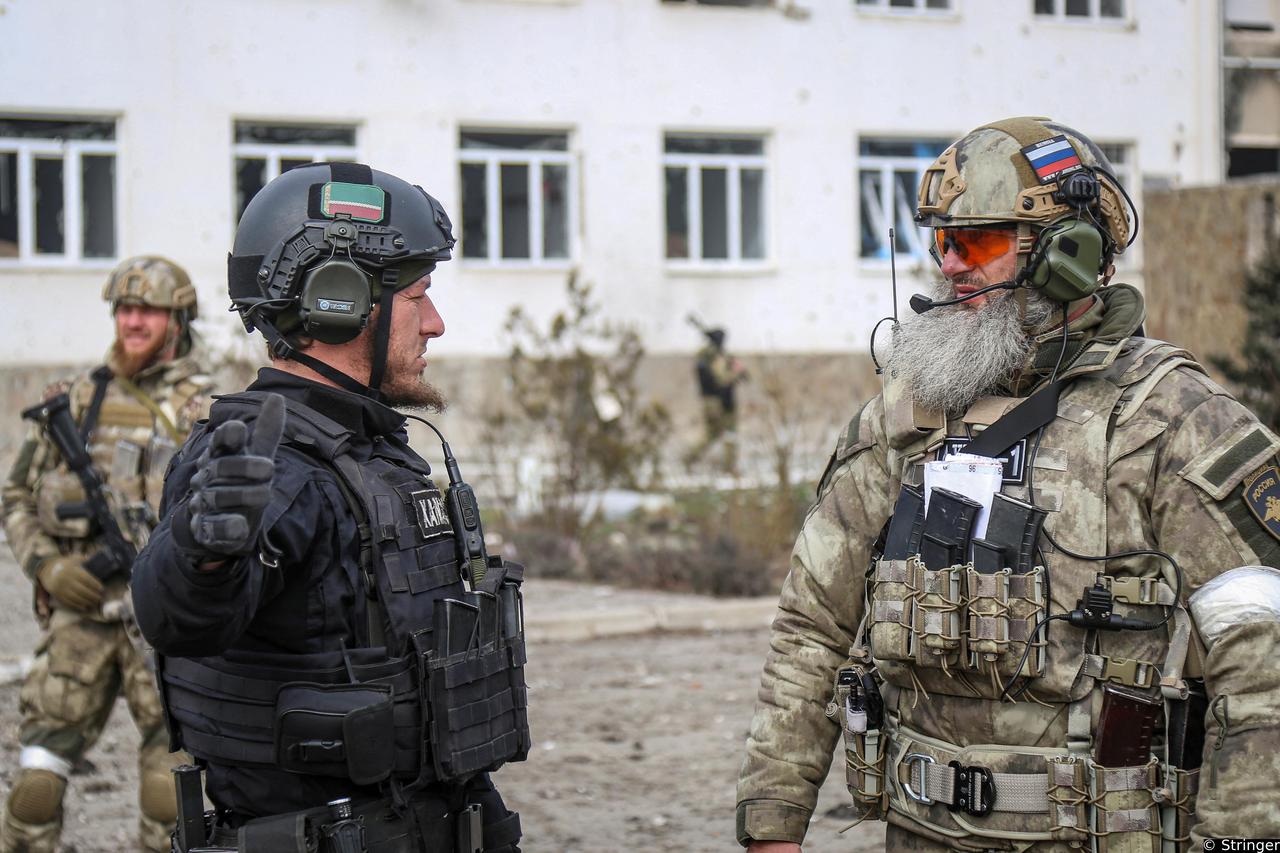 Service Members from Chechen Republic talk during fighting in Ukraine-Russia conflict in the city of Mariupol