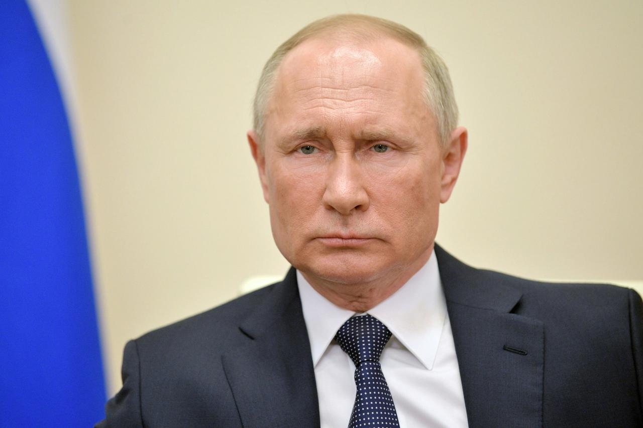 Russian President Putin delivers a televised address to the nation about the coronavirus disease outbreak, outside Moscow