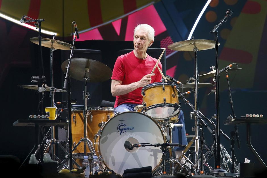 FILE PHOTO: Charlie Watts of British veteran rockers The Rolling Stones performs with his band members Mick Jagger, Keith Richards, and Ronnie Wood during a concert on their "Latin America Ole Tour" in Santiago