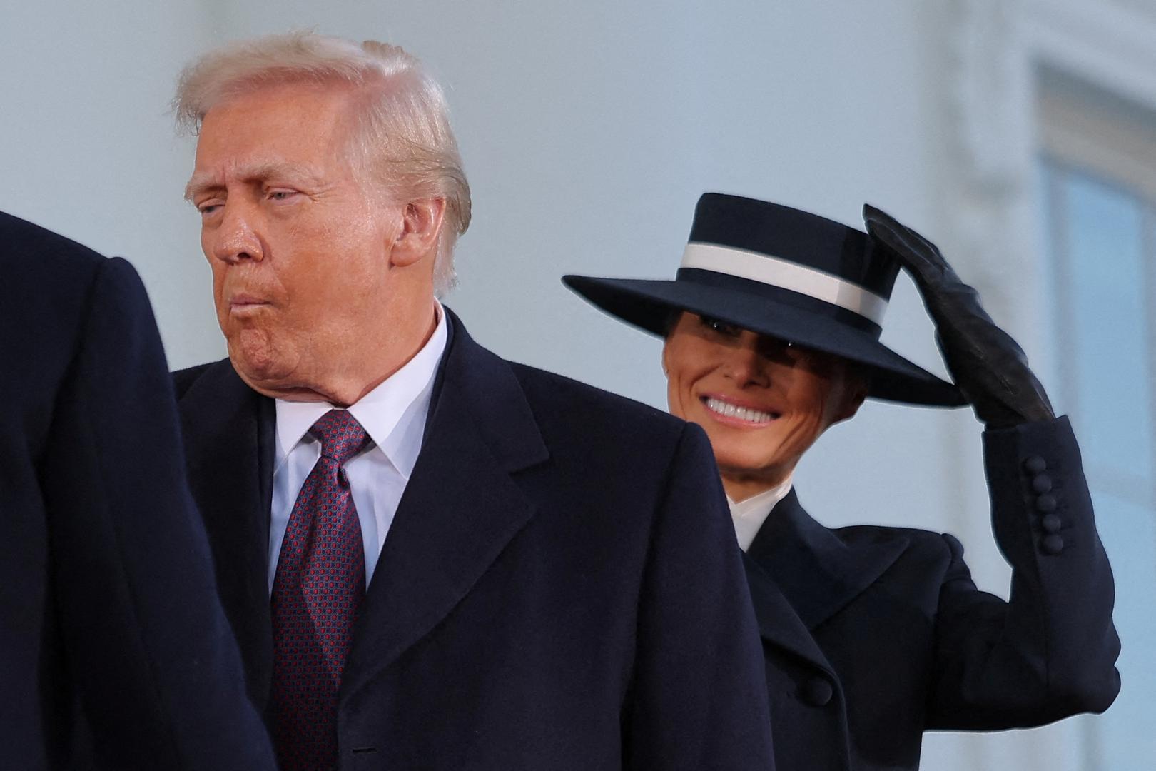 U.S. President-elect Donald Trump and his wife Melania Trump react as they meet with U.S. President Joe Biden and first lady Jill Biden on inauguration day of Donald Trump's second presidential term in Washington, U.S. January 20, 2025. REUTERS/Carlos Barria     TPX IMAGES OF THE DAY Photo: CARLOS BARRIA/REUTERS