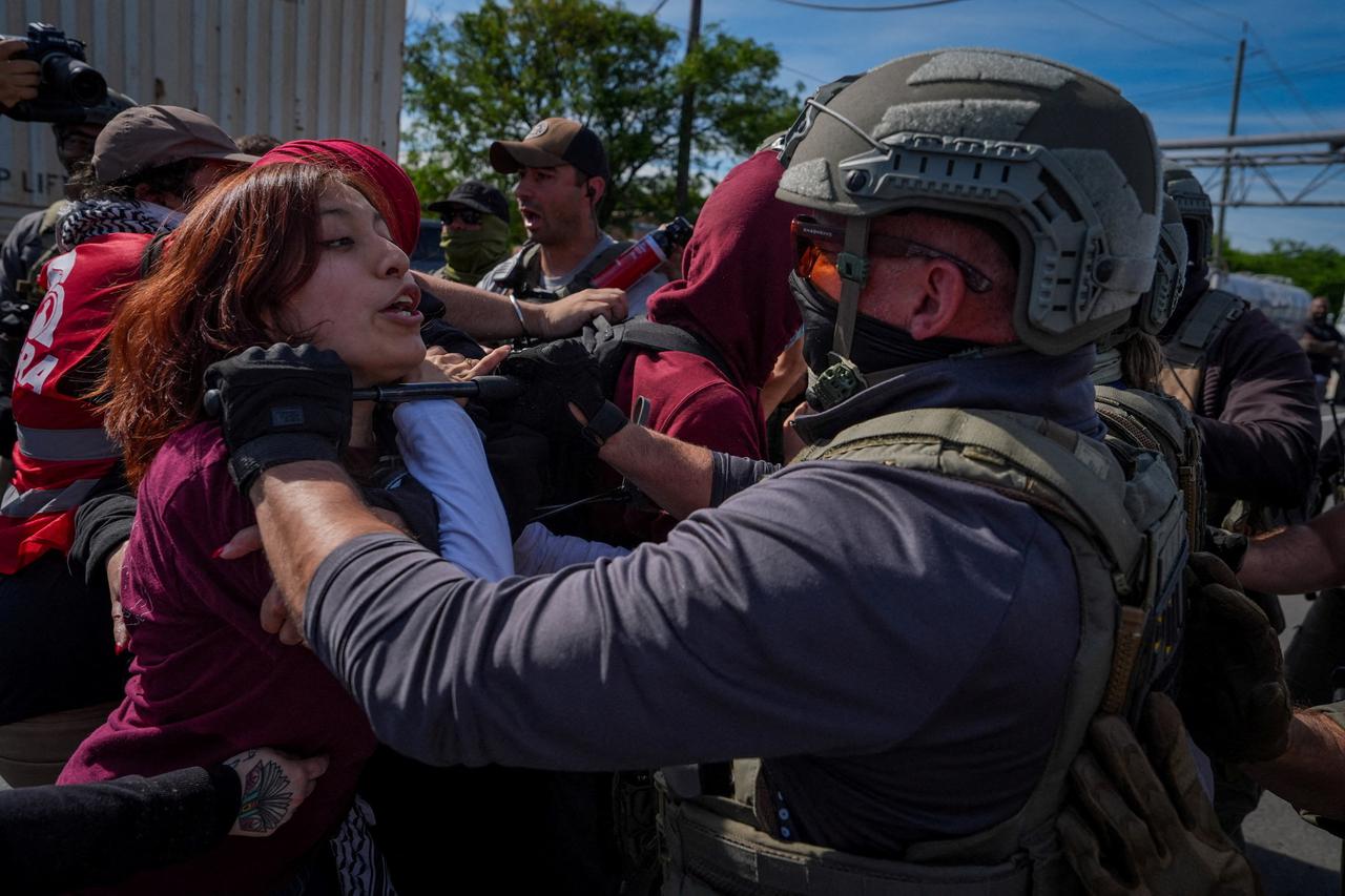 Protesters clash with ICE agents outside Delaney Hall in Newark