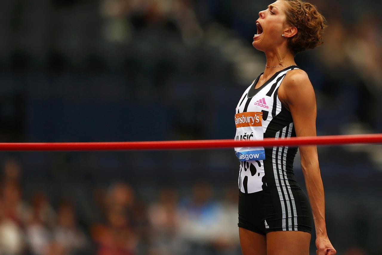 Blanka Vlasic of Croatia celebrates as she wins the women's high jump during the IAAF Diamond League athletics meeting at Hampden Park in Glasgow, July 12, 2014.  REUTERS/Phil Noble (BRITAIN  - Tags: SPORT ATHLETICS)