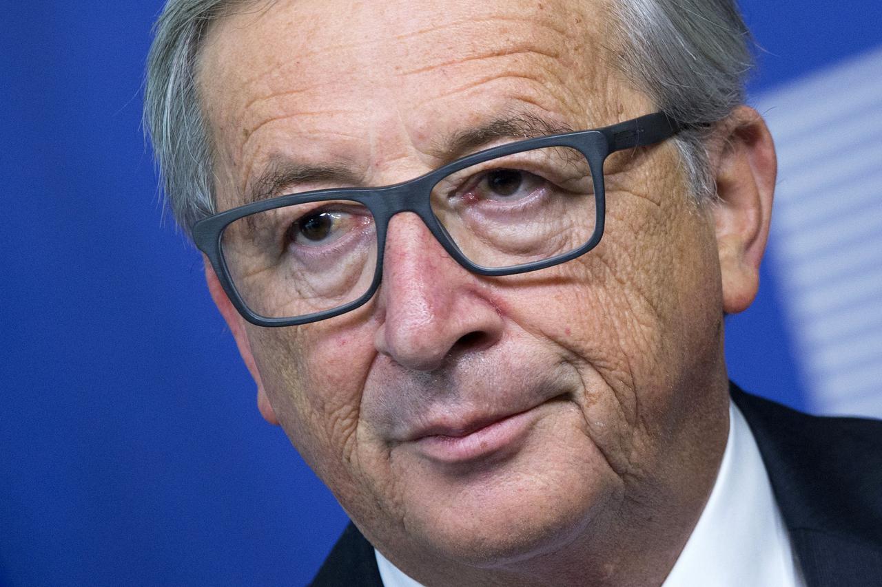 European Commission President Jean-Claude Juncker takes part in a news conference after a meeting with European Parliament President Martin Schulz at the EC headquarters in Brussels, October 15, 2015. Juncker pledged on Wednesday to work for fair new memb