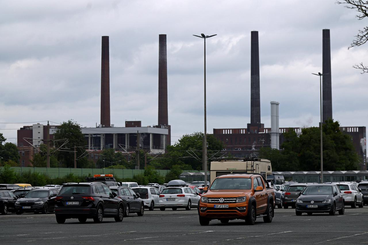 Cars park next to the Volkswagen factory in Wolfsburg