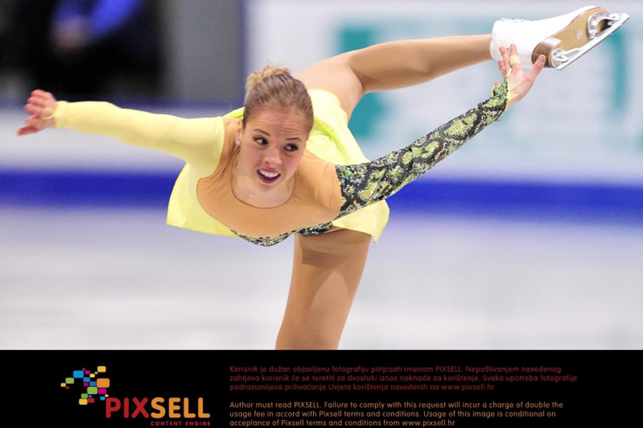 'Carolina Kostner of Italy performs her short program to take first place in the women\'s competition at the ISU Grand Prix of Figure Skating Final Friday, December 9, 2011 in Quebec City. THE CANADIA