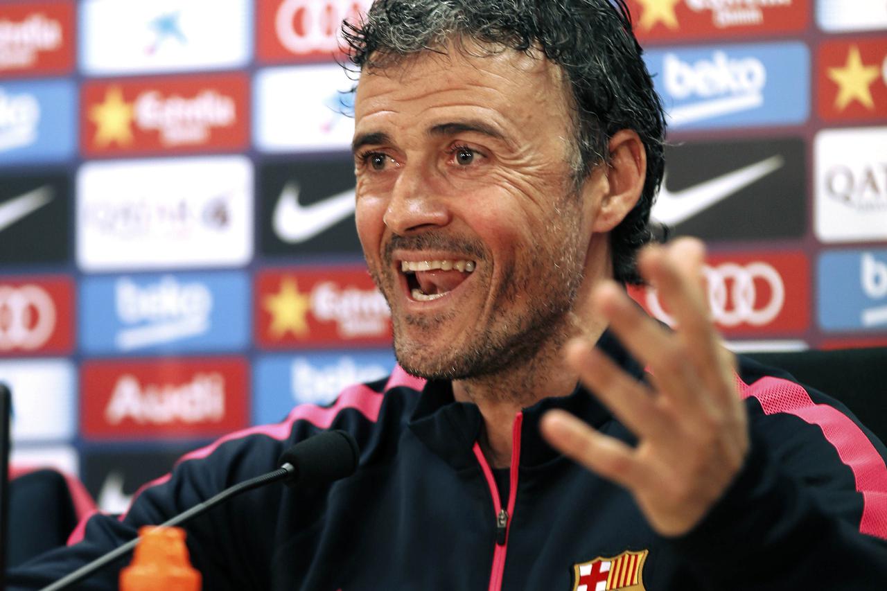 Barcelona's coach Luis Enrique smiles during the news conference at Ciutat Esportiva Joan Gamper in Sant Joan Despi near Barcelona March 13, 2015. REUTERS/Gustau Nacarino (SPAIN - Tags: SPORT SOCCER)