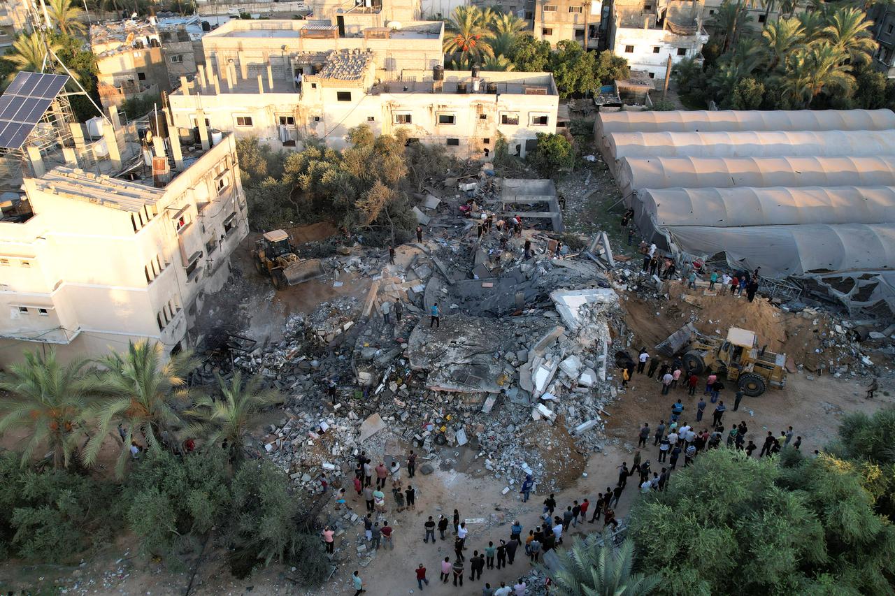 View of the remains of a Palestinian house destroyed in Israeli strikes in the central Gaza Strip