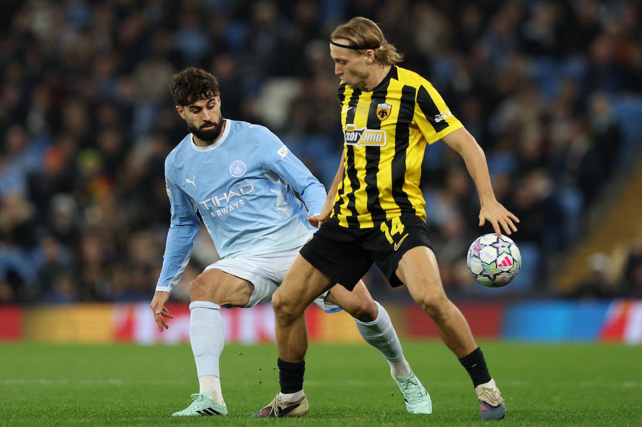 storyeditor/2026-10-21/2026-10-20T191857Z_1428756765_UP1EMAK1HNK9H_RTRMADP_3_SOCCER-CHAMPIONS-MCI-AEK.JPG