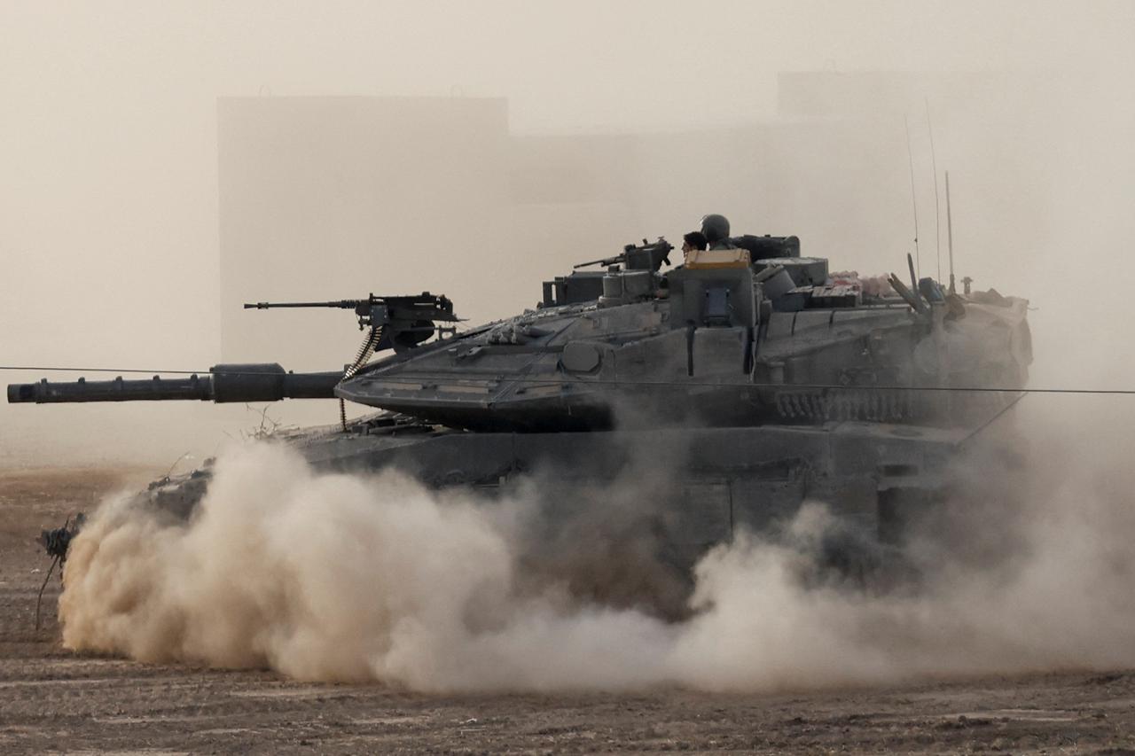 An Israeli tank manoeuvres in Gaza