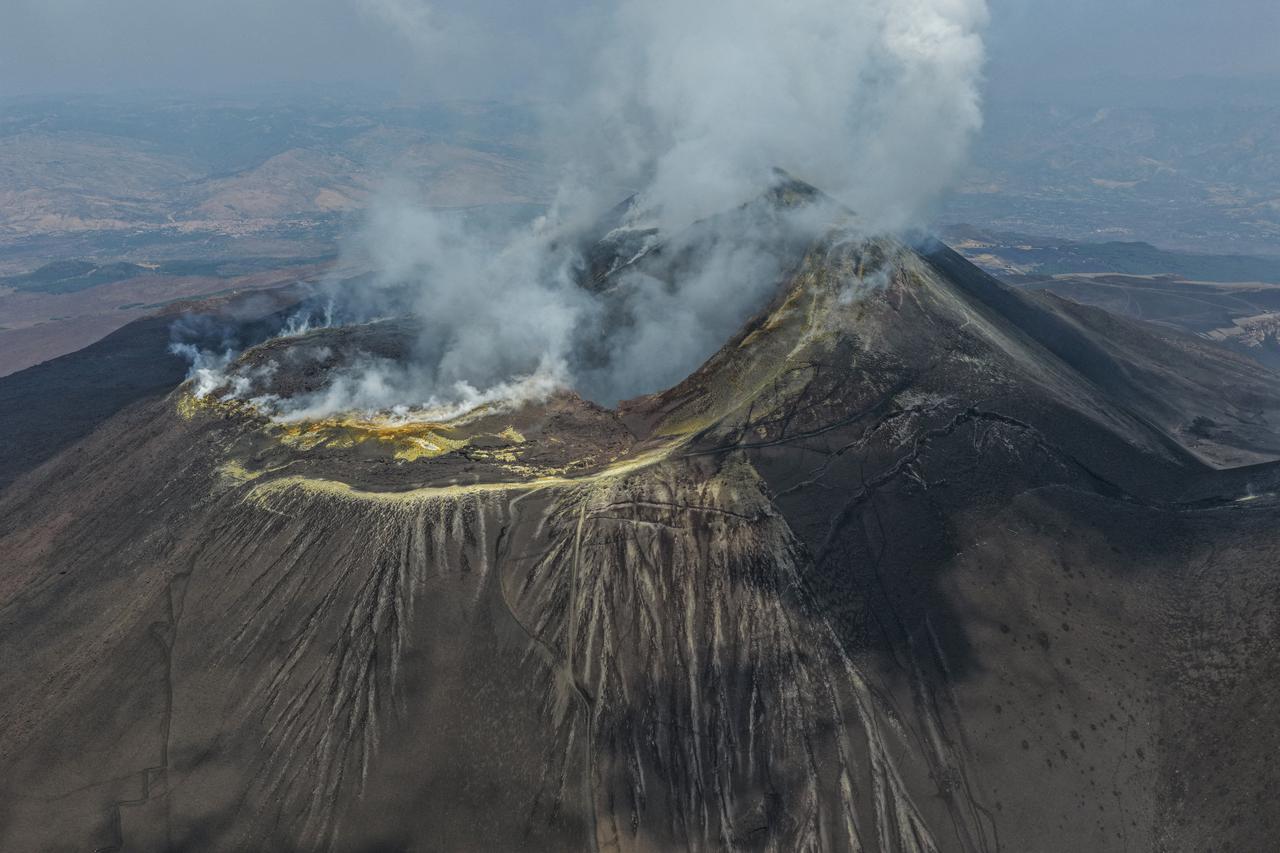 Italy's Mount Etna erupts