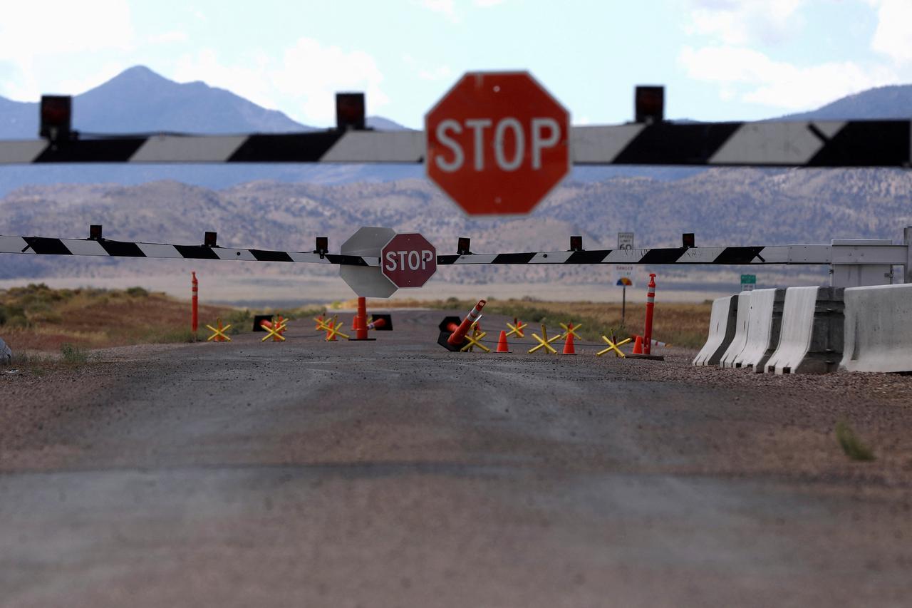 FILE PHOTO: Closed gates at the entrance to Area 51 as an influx of tourists responding to a call to 'storm' Area 51, a secretive U.S. military base believed by UFO enthusiasts to hold government secrets about extra-terrestrials, is expected in Rachel, Ne