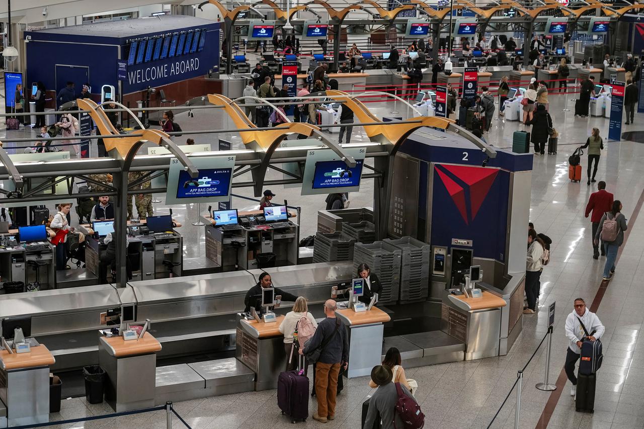 Air travellers face the morning commute at Hartsfield-Jackson Atlanta International Airport