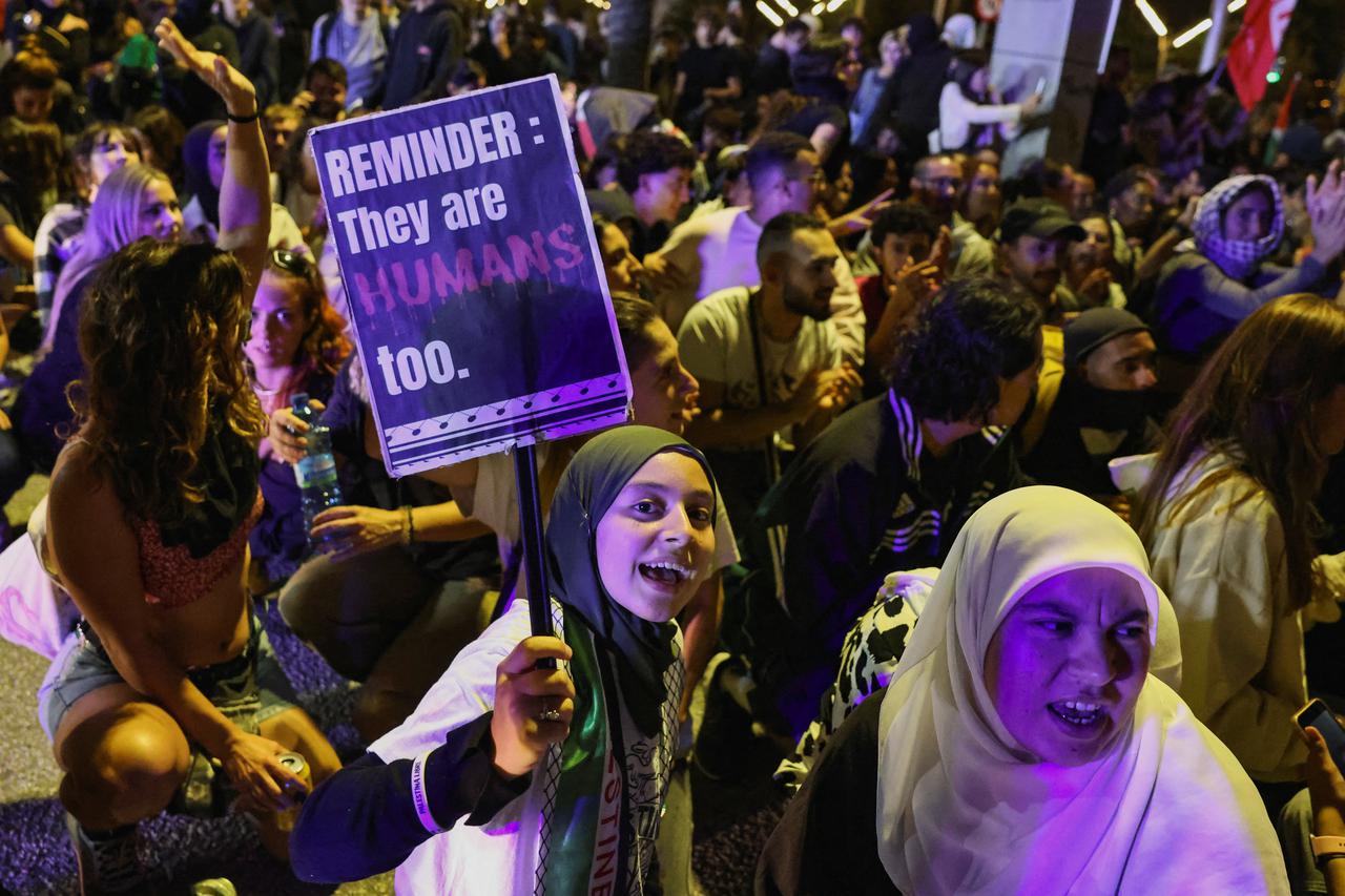 Pro-Palestinian demonstrators protest to condemn the interception of some of the vessels of the Global Sumud Flotilla, in Barcelona
