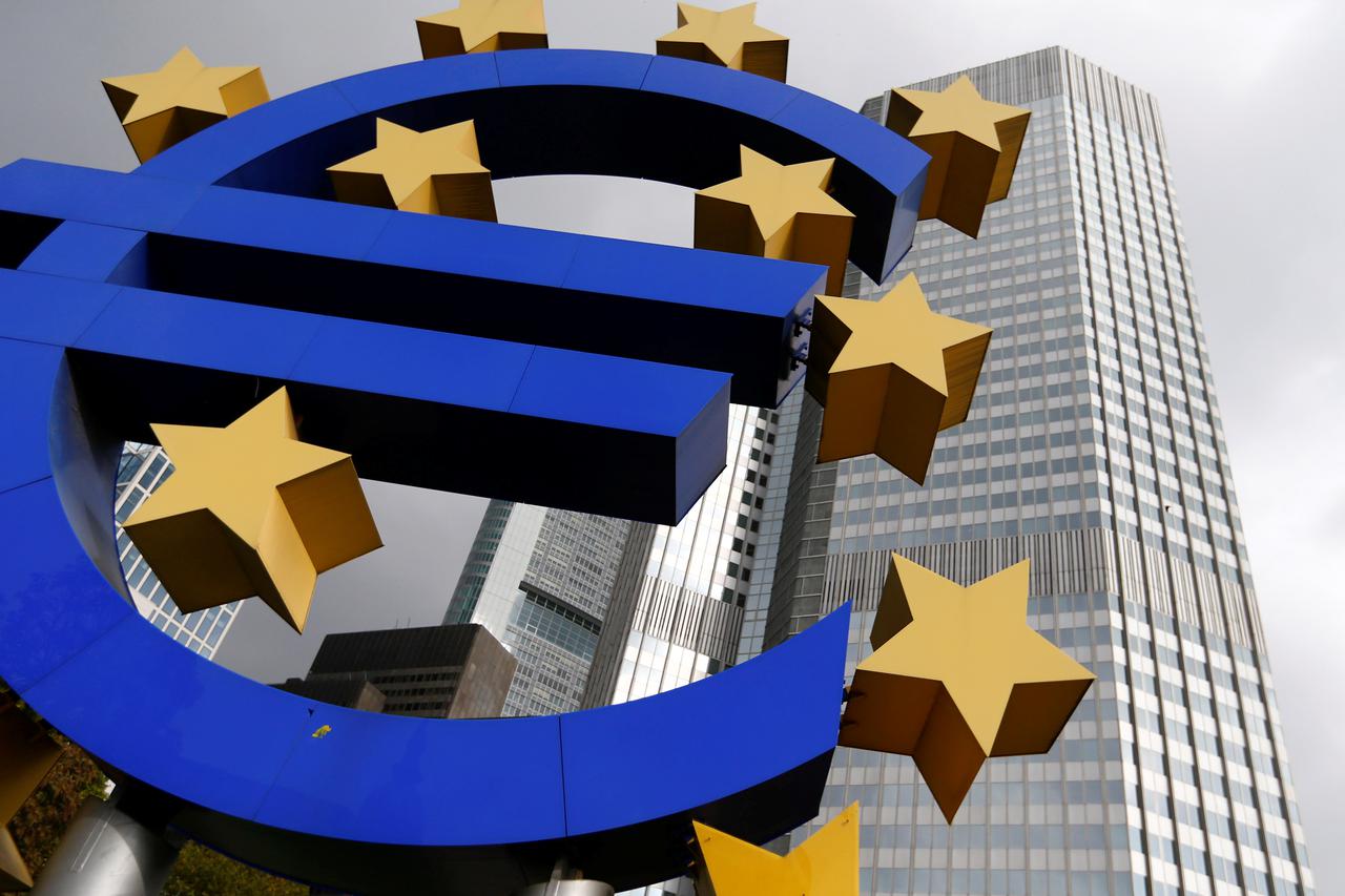 FILE PHOTO: A euro logo sculpture stands in front the headquarters of the European Central Bank  in Frankfurt