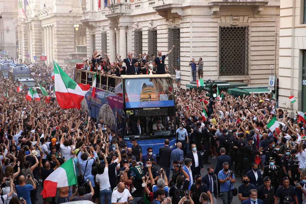 The Italy team drive through Rome on a open top bus tour after they won Euro 2020