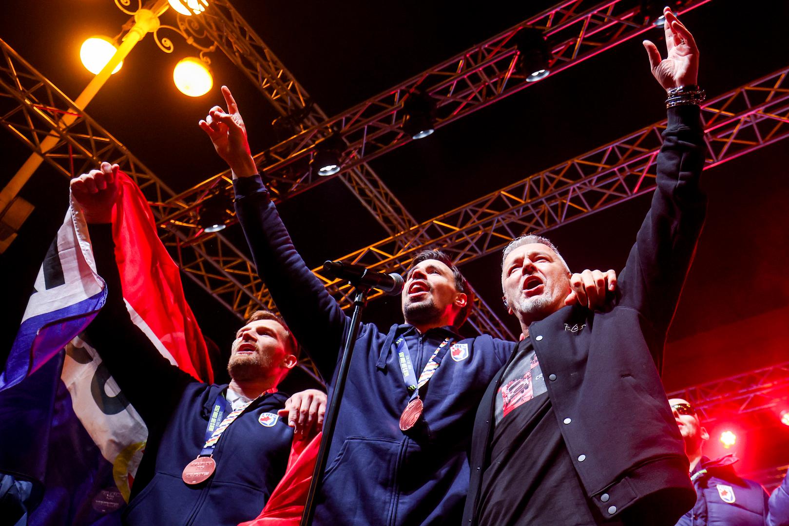 02.02.2026., Zagreb - Svecani docek hrvatske rukometne reprezentacije u na Trgu bana Josipa Jelacica nakon osvojene broncane medalje na Europskom rukometnom prvenstvu. David Mandic, Ivan Martinovic i Marko Perkovic Thompson Photo: Igor Kralj/PIXSELL
