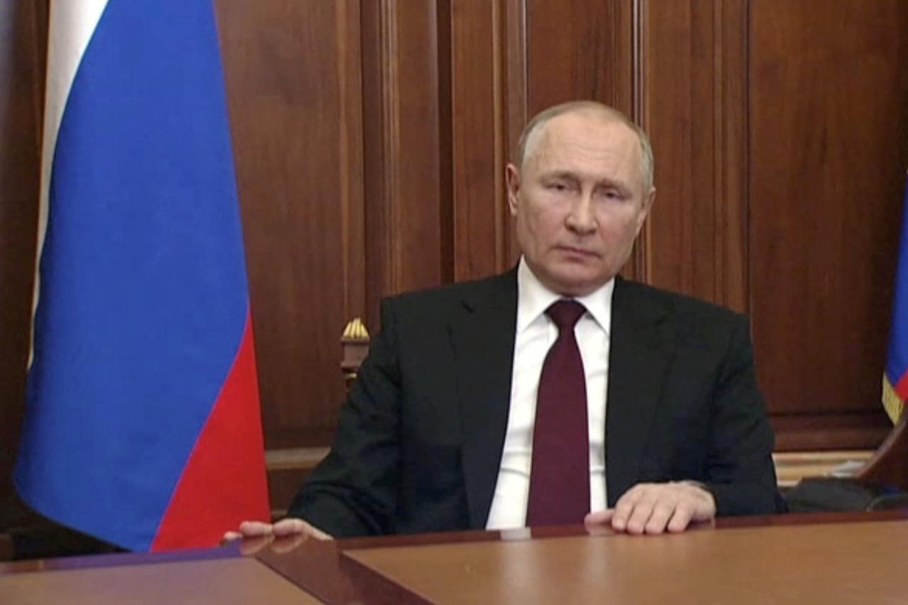 FILE PHOTO: Russian President Vladimir Putin delivers a video address to the nation in Moscow