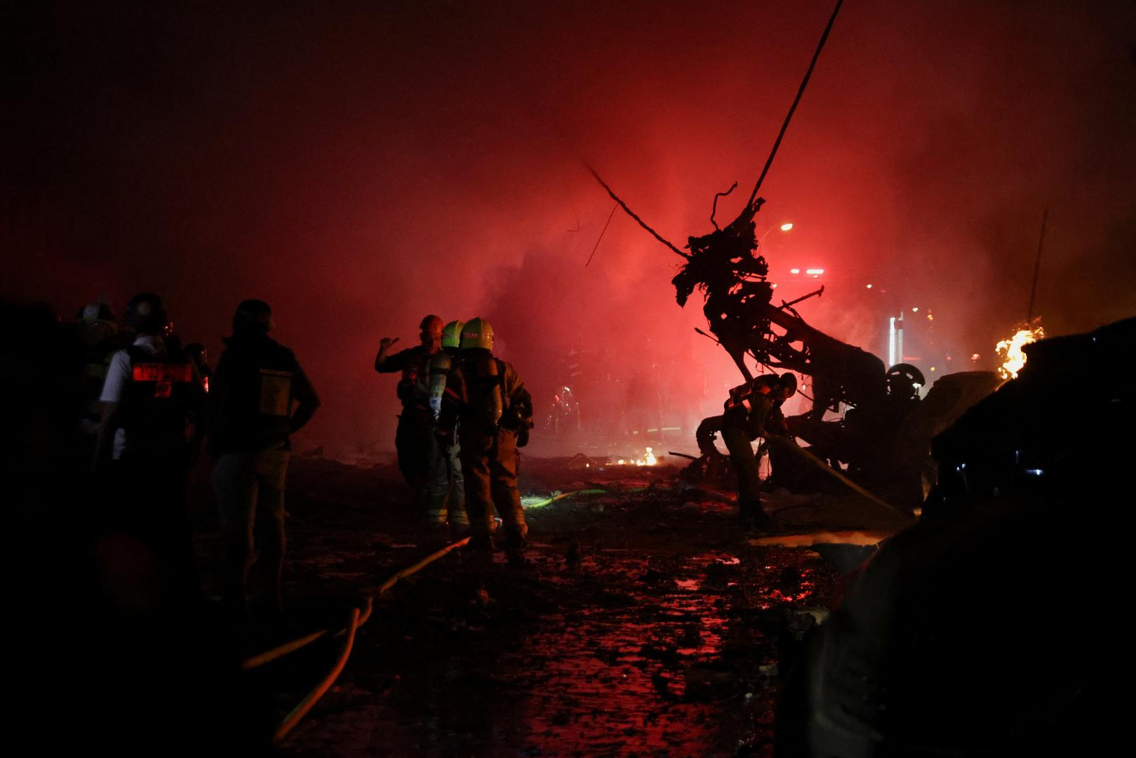 Emergency personnel operate after missiles were launched from Iran to Israel, in Haifa, Israel, June 15, 2025. REUTERS/Shir Torem Photo: SHIR TOREM/REUTERS