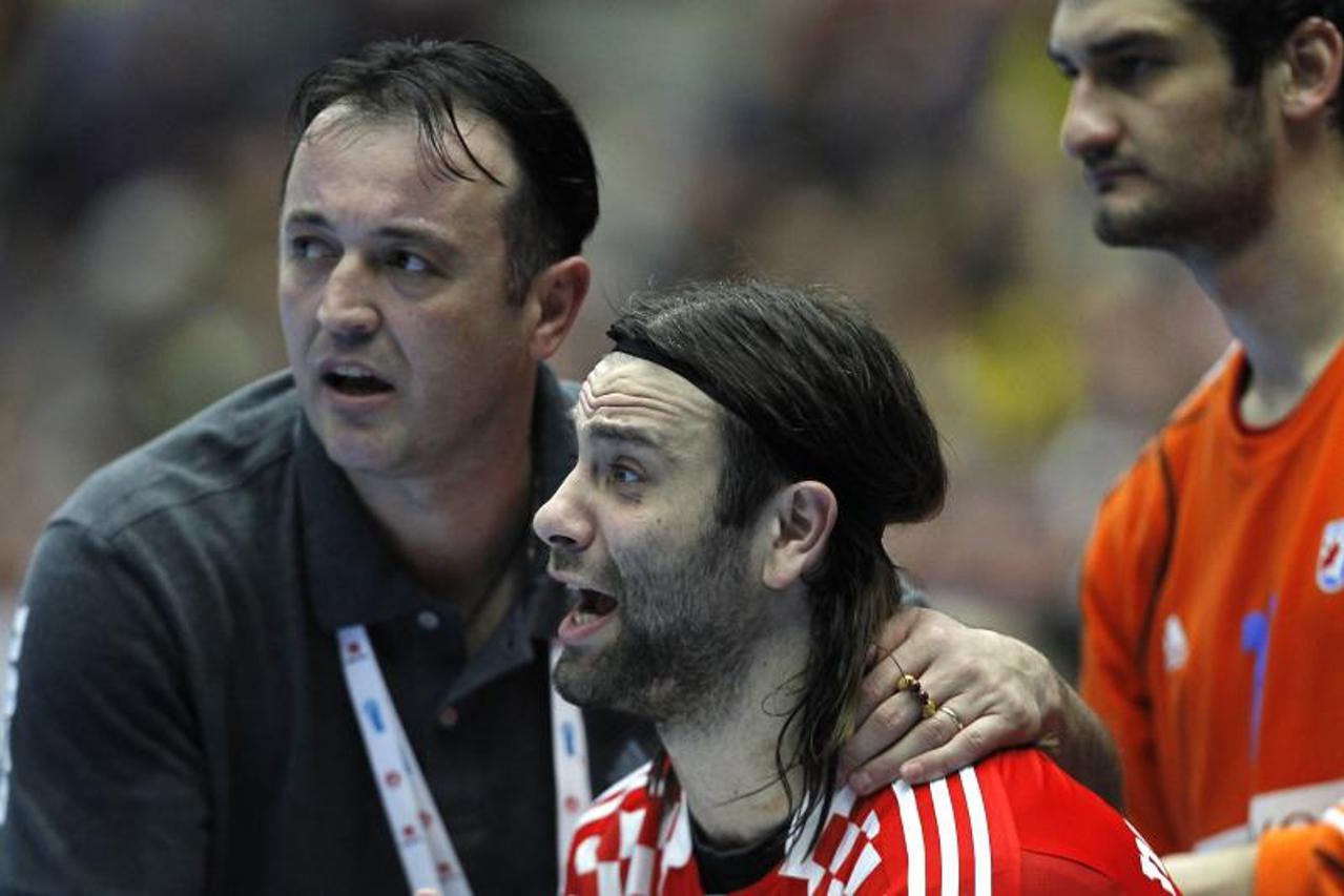 \'23.01.2011., Malmo, Svedska - Svjetsko prvenstvo u rukometu, druga utakmica drugog kruga, Hrvatska - Svedska. Slavko Goluza, Ivano Balic. Photo: Antonio Bronic/PIXSELL\'