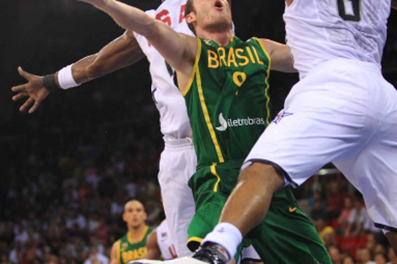 '30.08.2010., Istanbul ?2010 FIBA SP Istanbul. Utakmica grupe B SAD-Brazil u Abdi Ipekci Areni. Lamar Odom,Marcelo Huertas i Derrick Rose Photo: Zeljko Lukunic/PIXSELL'
