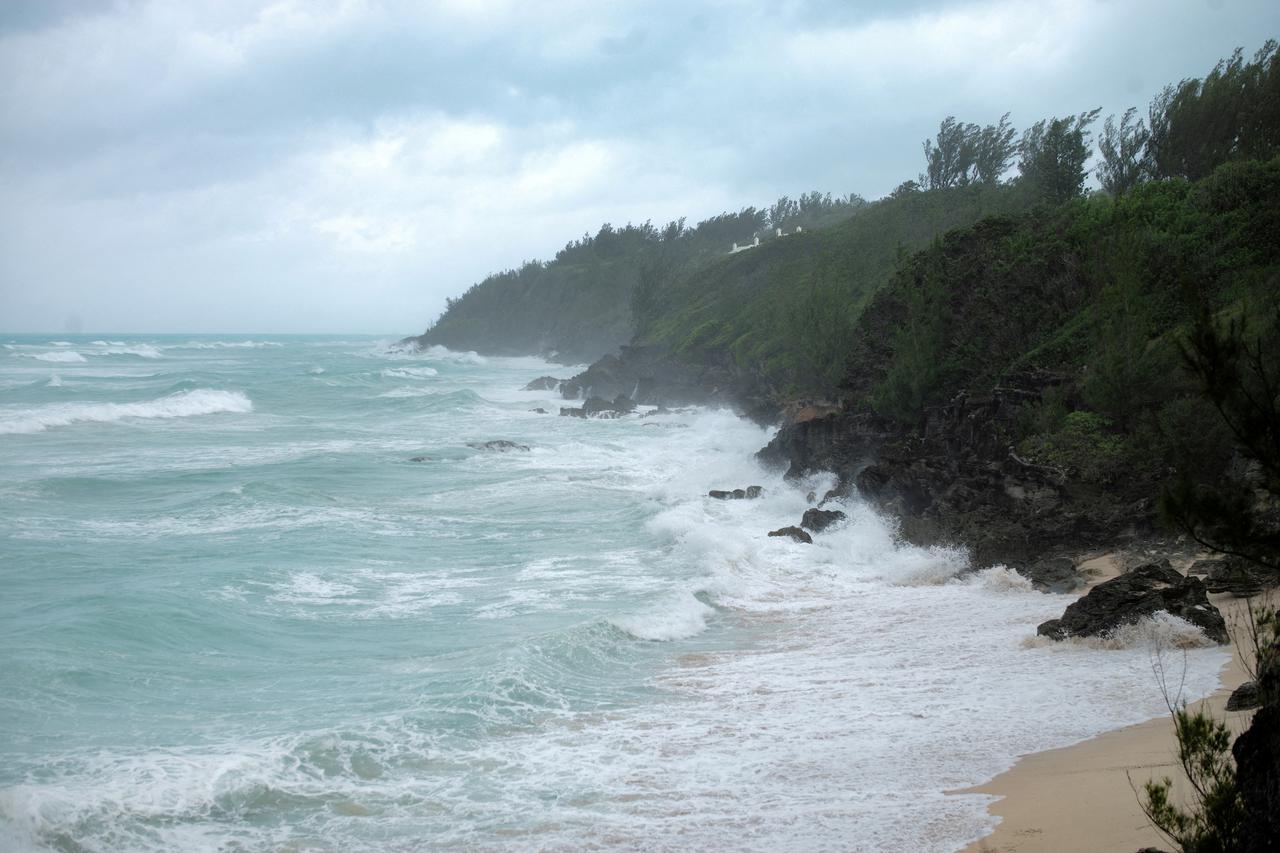 FILE PHOTO: Riptides and waves crash against the South Shore as winds from Hurricane Ernesto approach Bermuda