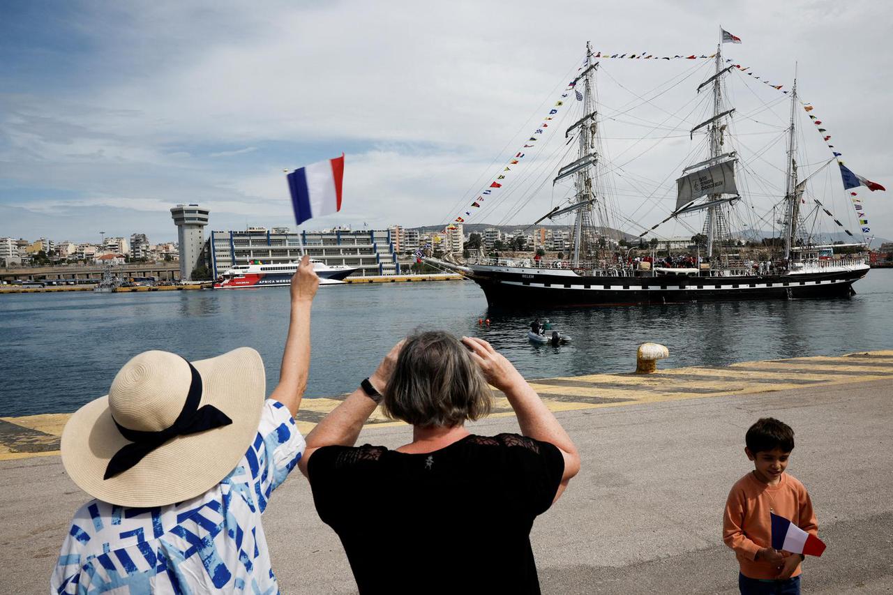 The Olympic flame departs Greece on the sailing ship Belem for the 2024 Paris Games, in the port of Piraeus