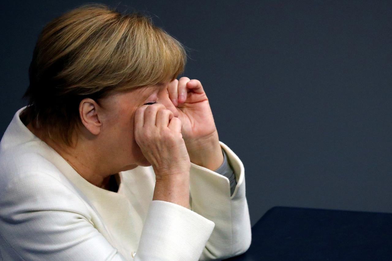 German Chancellor Angela Merkel attends a session of the Bundestag, in Berlin