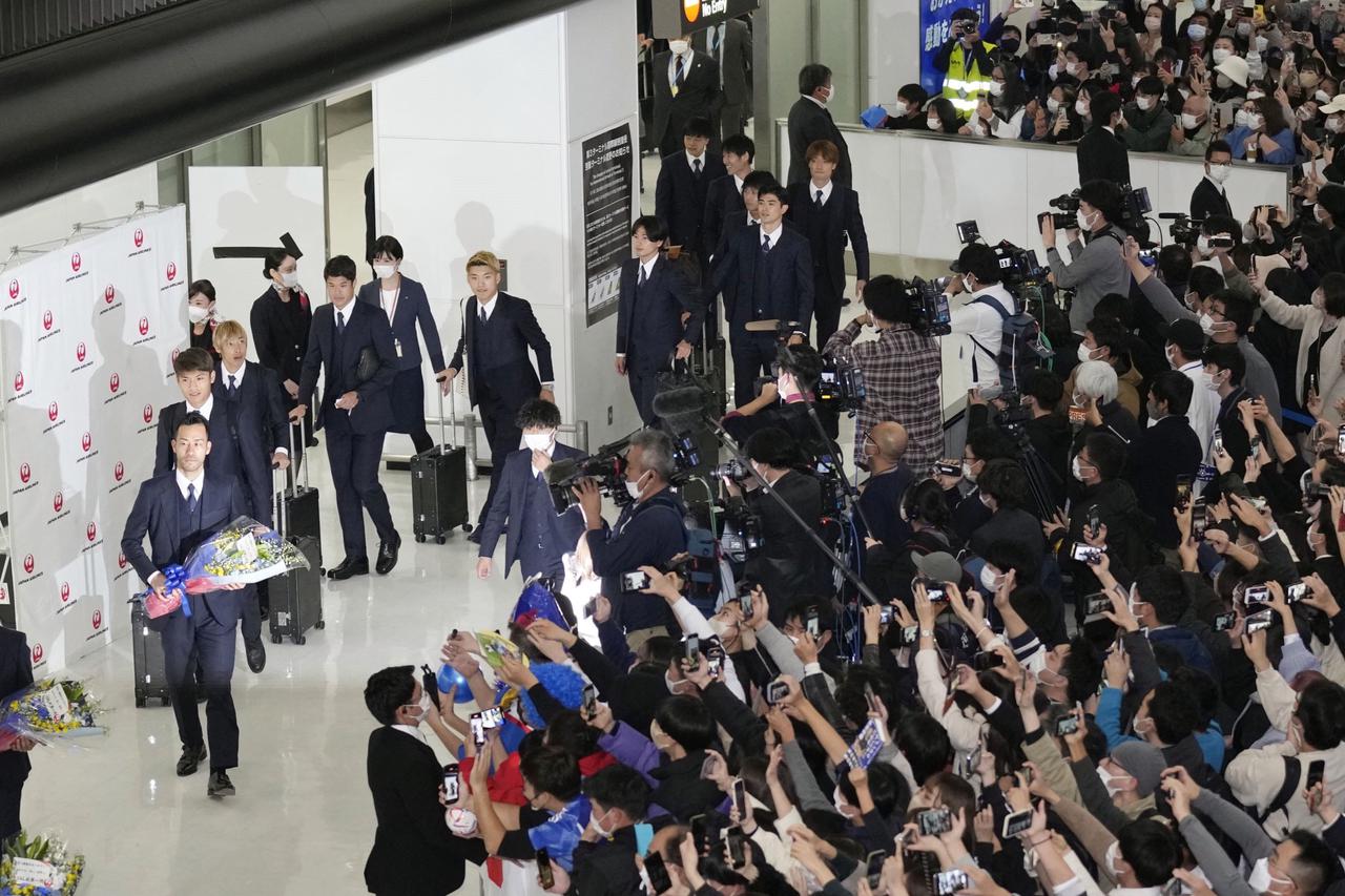 Japan football players return from World Cup in Qatar