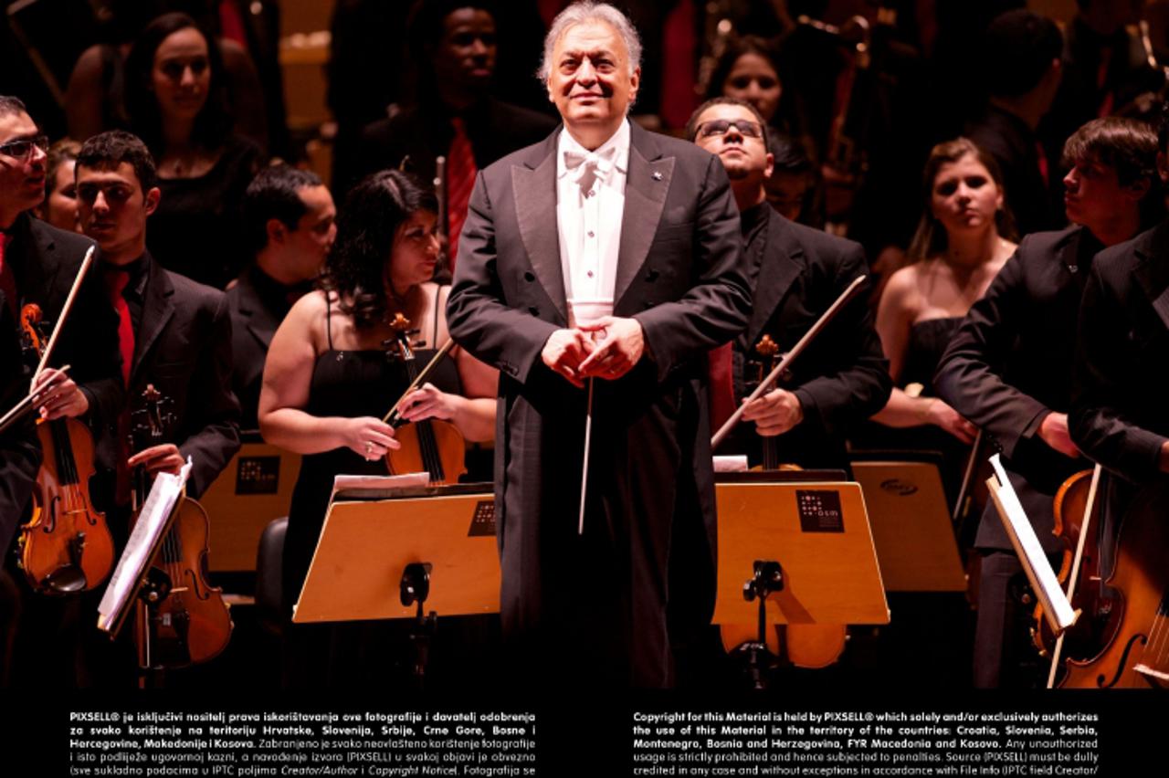 'Indian conductor Zubin Mehta conducts Heliopolis Symphony Orchestra, with residents of Heliopolis slum, the biggest of Latin America, at the Municipal Theater of Sao Paulo, in central Sao Paulo, Braz