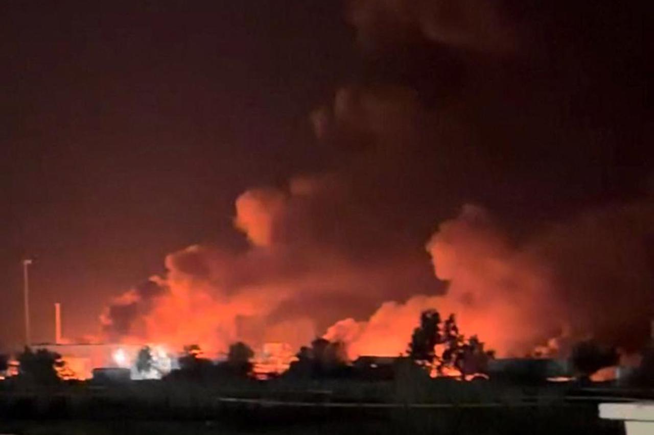 Smoke rises from a port following a U.S. strike in Kuhestak