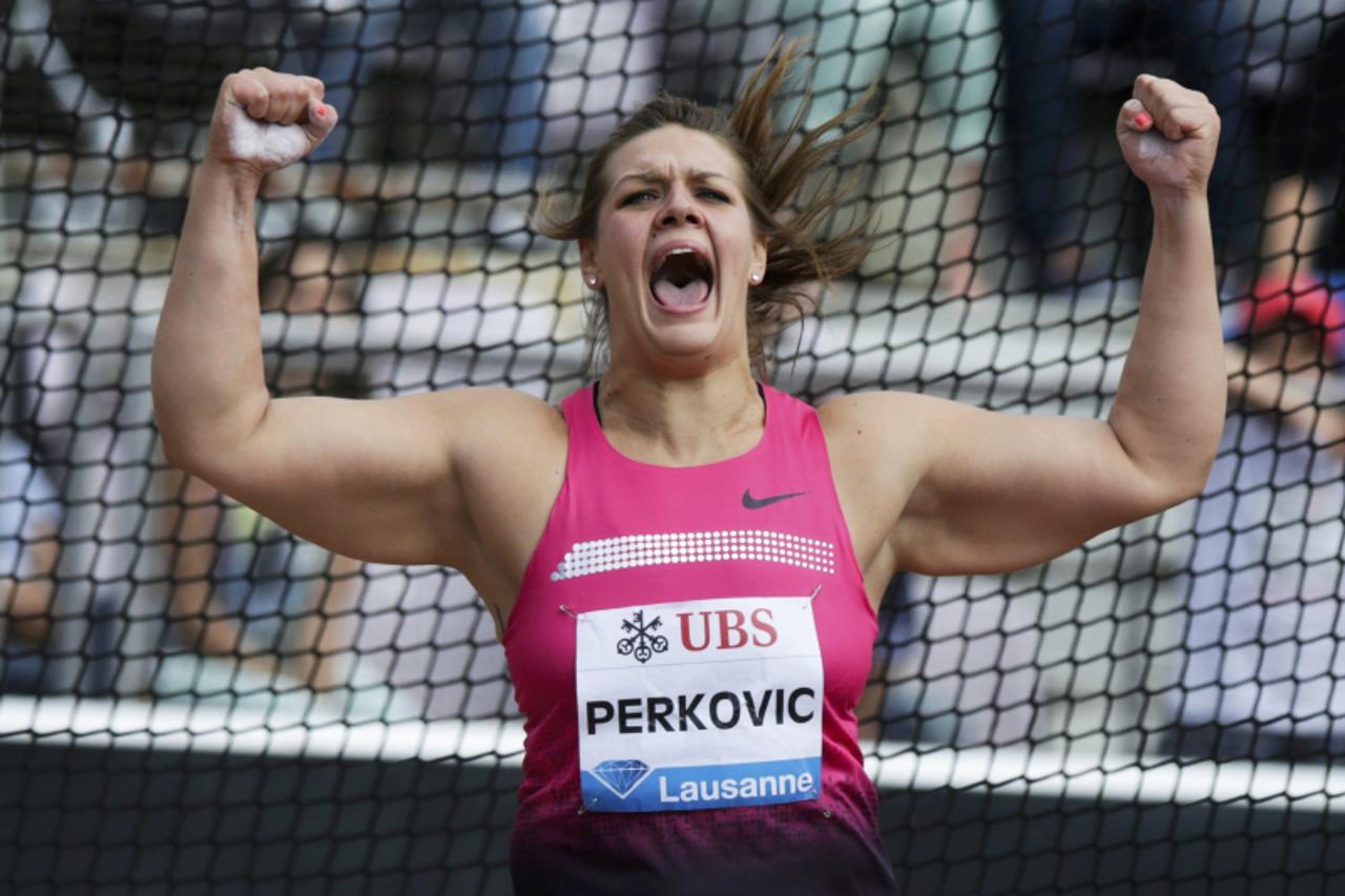 'Sandra Perkovic of Croatia reacts after winning in the Discus event of the Lausanne Diamond League meeting in Lausanne, July 4, 2013.    REUTERS/Denis Balibouse (SWITZERLAND  - Tags: SPORT ATHLETICS 