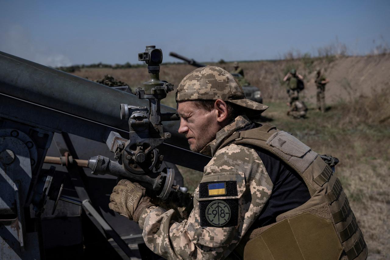 FILE PHOTO: Ukrainian serviceman points a small MLRS before firing toward Russian troops near a front line in Zaporizhzhia region