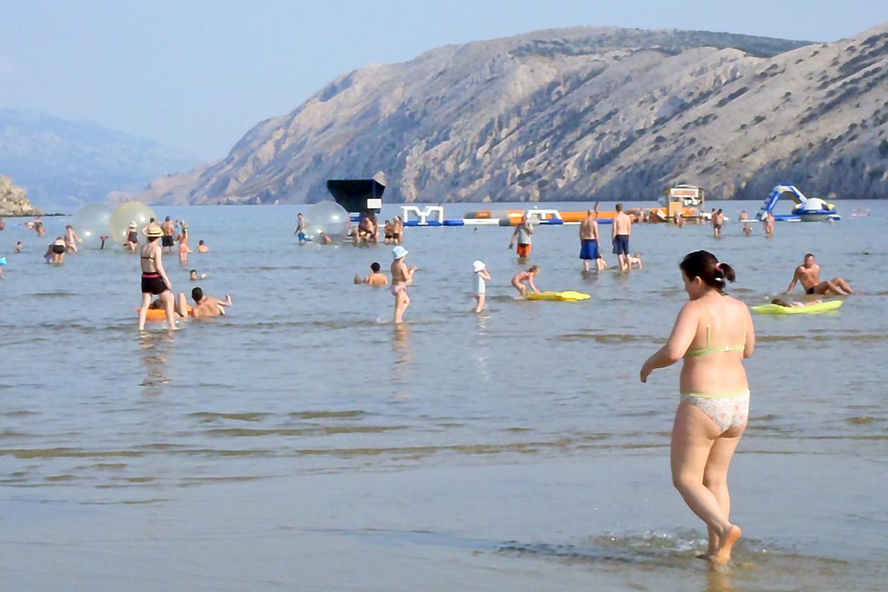 13.07.2013., Lopar - Rajska plaza u Loparuna otoku Rabu uvrstena je medju 100 najlijepsih plaza svijeta.Photo: Borna Filic/PIXSELL