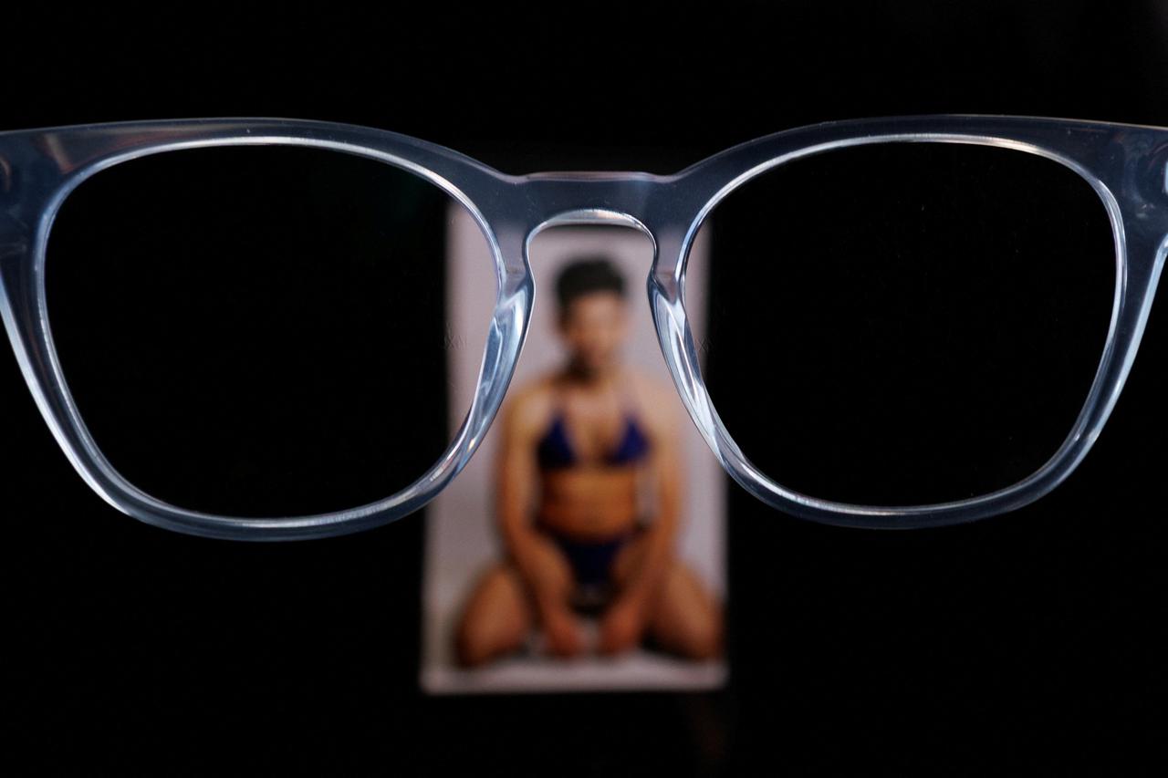 Illustration photo of a sexualized photorealistic image generated by Grok