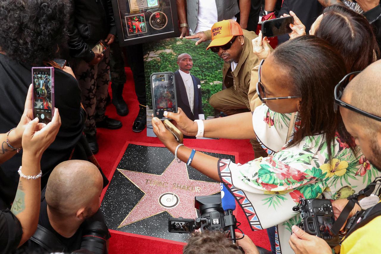 Rapper Tupac Shakur's star is unveiled posthumously on the Hollywood Walk of Fame in Los Angeles