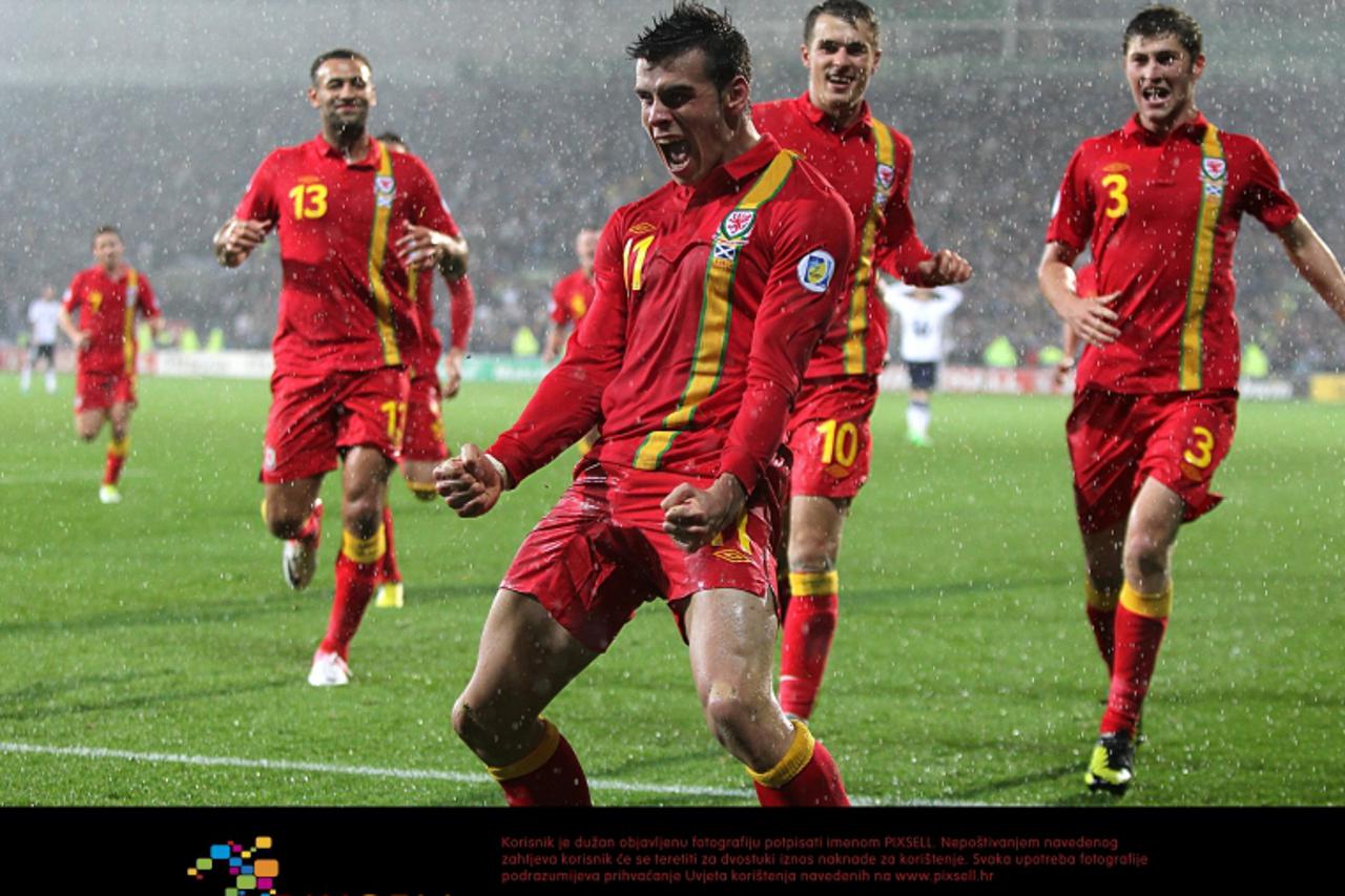 'Wales\'s Gareth Bale celebrates scoring his side\'s second goal of the game Photo: Press Association/Pixsell'